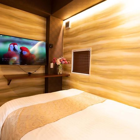 Hotel Xcell Hiroshima Nagarekawa Quarto foto