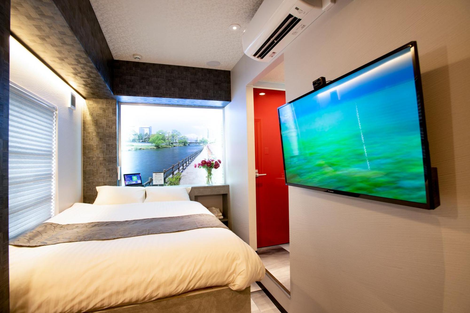 Hotel Xcell Hiroshima Nagarekawa Quarto foto