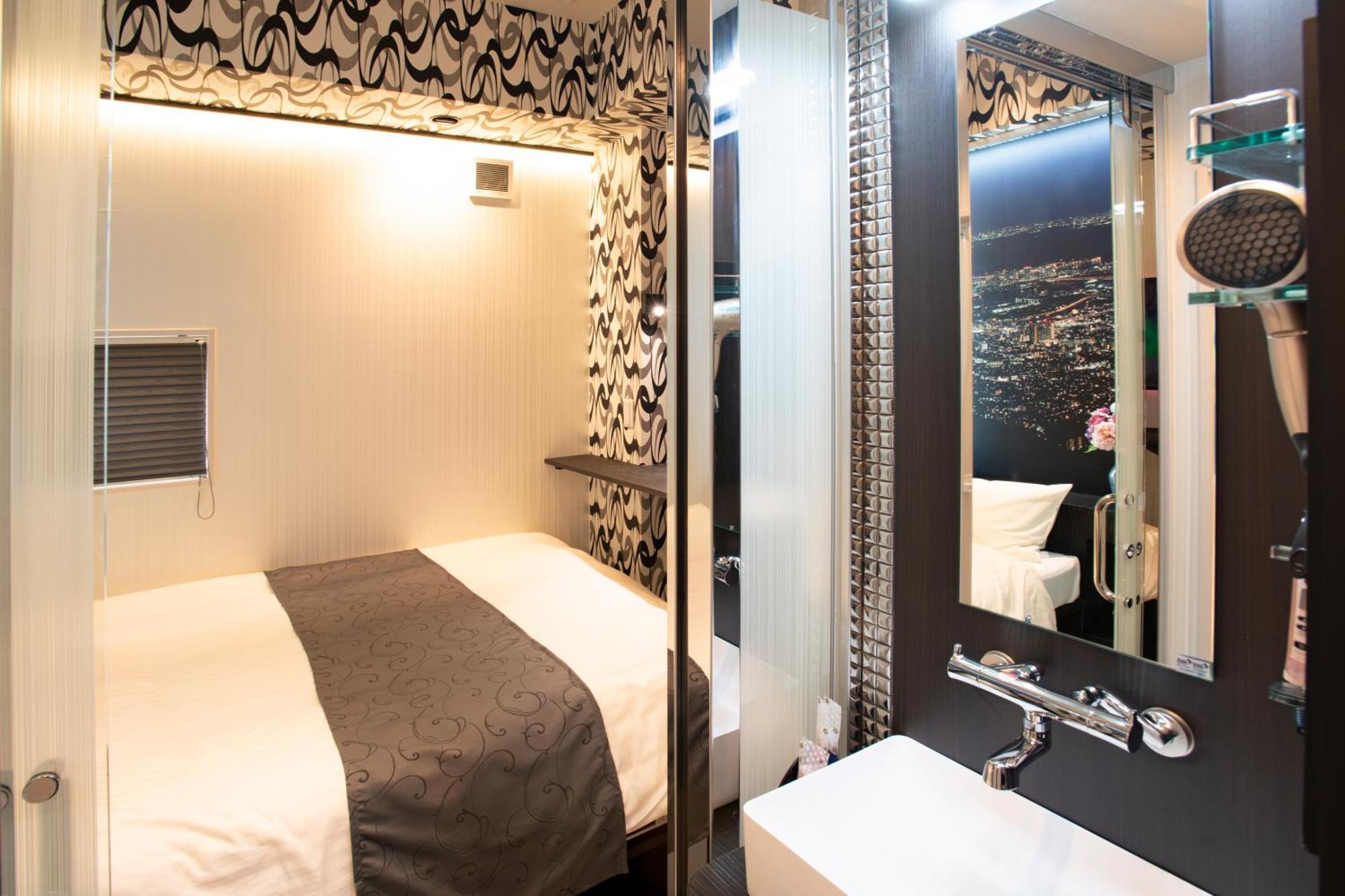 Hotel Xcell Hiroshima Nagarekawa Quarto foto
