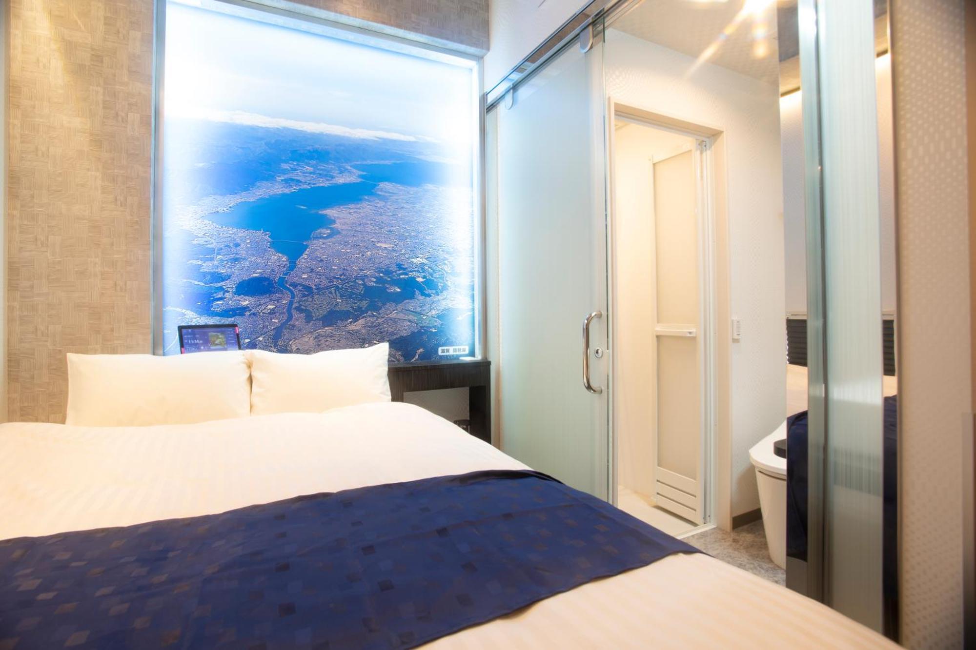 Hotel Xcell Hiroshima Nagarekawa Quarto foto