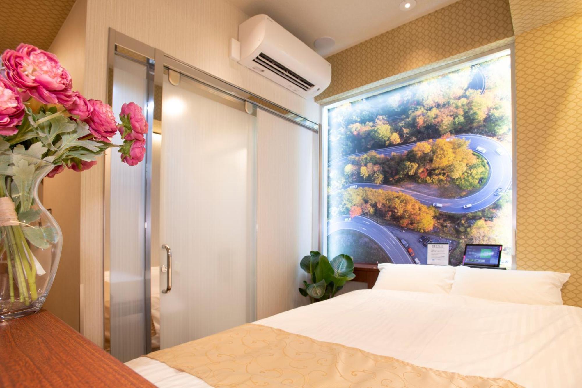 Hotel Xcell Hiroshima Nagarekawa Quarto foto